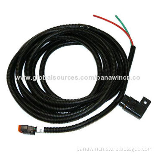 Automotive wiring harness with positive/negative leads from OEM factory